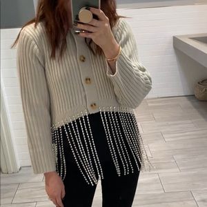 Sweater with dripping crystals